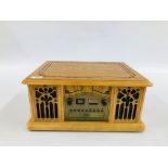 A REPRODUCTION "NOSTALGIC" DESIGN CD / RADIO / RECORD / CASSETTE MUSIC PLAYER - SOLD AS SEEN.