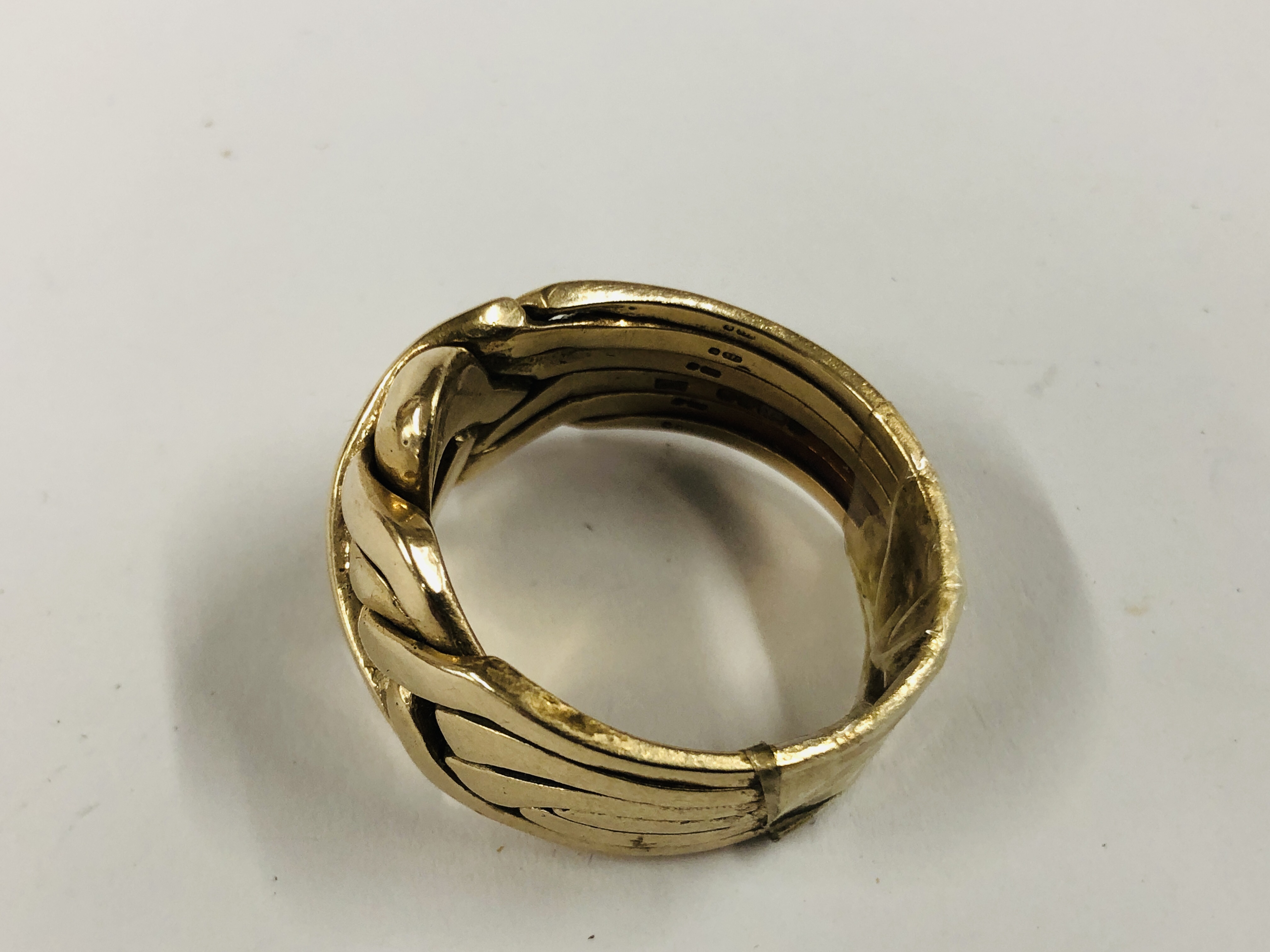 A 9CT GOLD PUZZLE RING. - Image 8 of 10