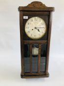 AN OAK CASED REGULATOR STYLE STRIKING WALL CLOCK