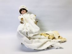 A VINTAGE GERMAN PORCELAIN DOLL STAMPED 1894 A.M.