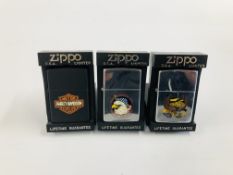 A GROUP OF THREE HARLEY DAVIDSON ZIPPO LIGHTERS IN ORIGINAL CASES.