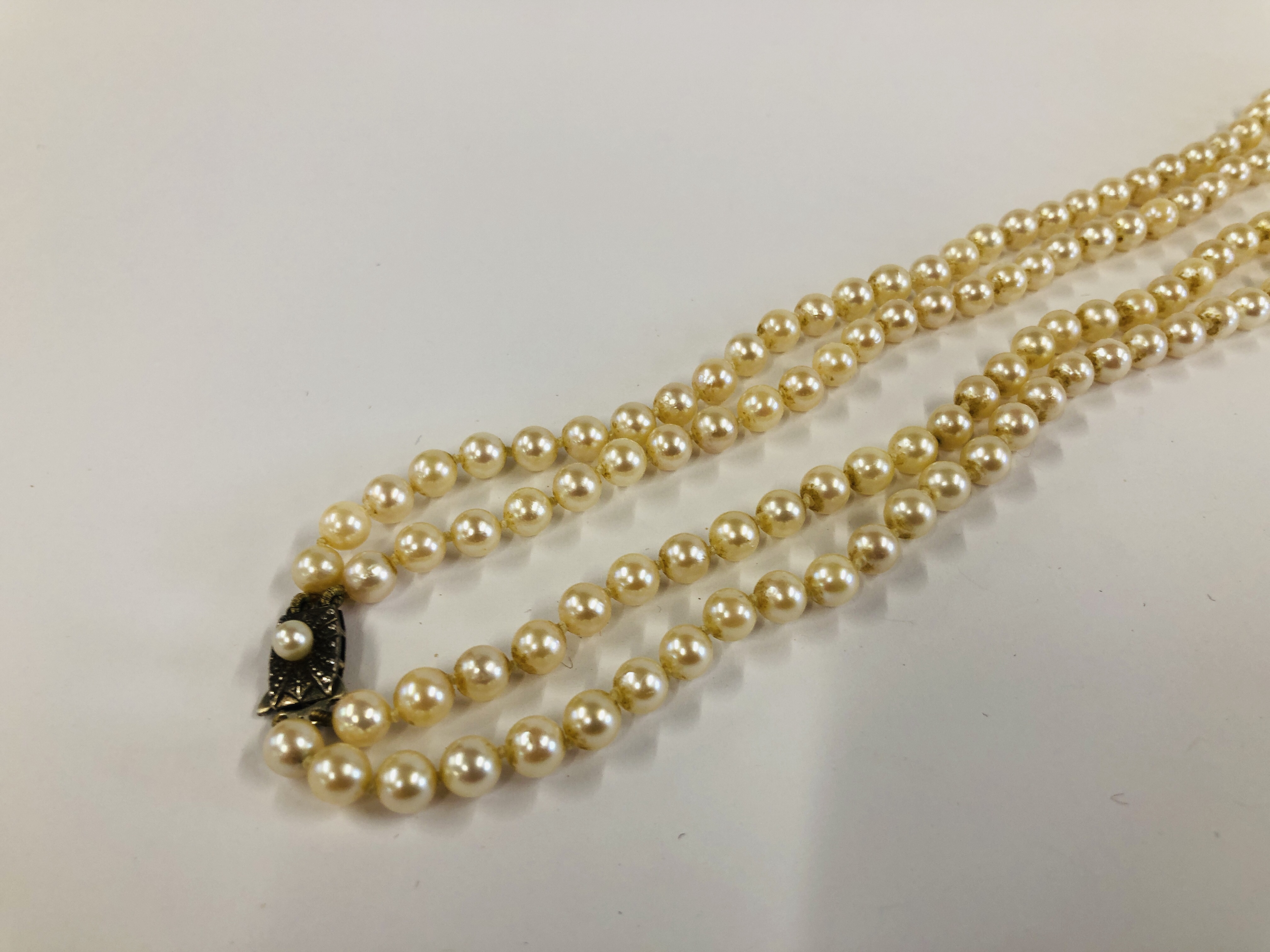 A VINTAGE DOUBLE ROW PEARL NECKLACE BY "MIKIMOTO" ALONG WITH AN ORIGINAL VINTAGE MIKIMOTO SILK - Image 4 of 10