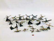 A COLLECTION OF 22 MAINLY DIE-CAST MODEL MILITARY PLANES MANY ON STAND.