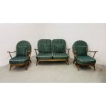 AN ERCOL 3 PIECE SUITE COMPRISING OF 2 SEATER SOFA AND 2 ARM CHAIRS.