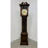 A REPRODUCTION OAK LONG CASE CLOCK WITH LINEN FOLD DETAIL.