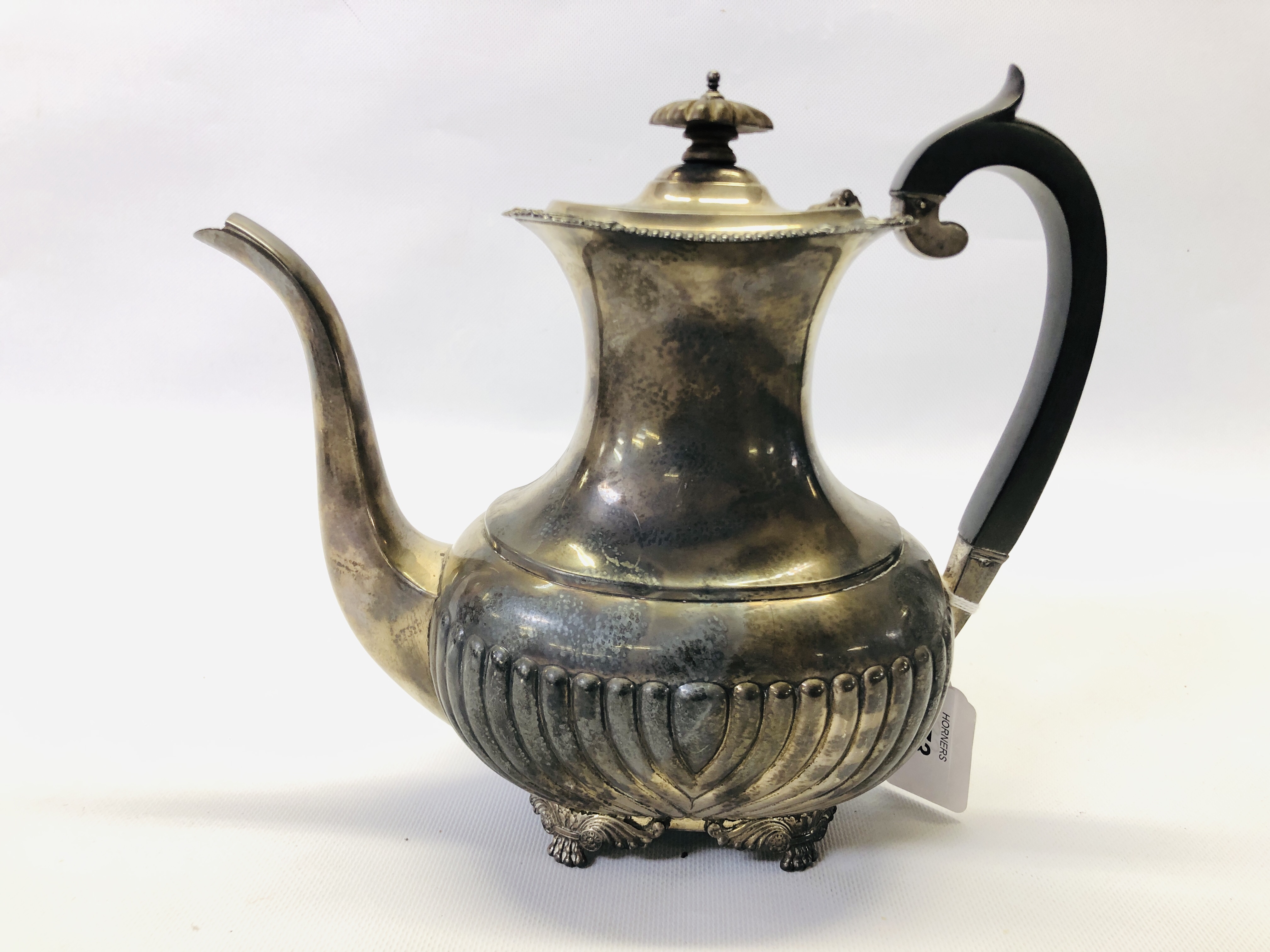 A SILVER COFFEE POT, HAVING AGADROONED BODY, BARNARD & SON,