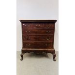 AN ANTIQUE MAHOGANY THREE OVER THREE DRAWER CHEST ON SPLAYED LEG,