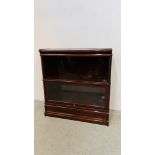 A SMALL GLOBE WERNICK STYLE BOOKCASE WITH LOWER GLASS DOOR.