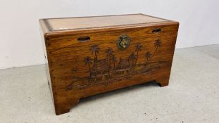 A MAHOGANY CAMPHOR WOOD LINED BLANKET BOX WITH HAND CARVED ORIENTAL DESIGN WIDTH 91CM. DEPTH 48CM.