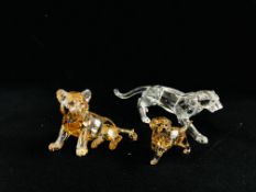 A GROUP OF 3 SWAROVSKI CABINET ORNAMENTS IN ORIGINAL BOXES TO INCLUDE A DOG, TIGER AND A LEOPARD.