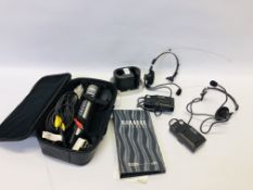 A CASED MAGIC SING ET12K MICROPHONE WITH ACCESSORIES AND 2 REALISTIC VOICE ACTUATED FM TRANSCEIVERS