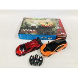 A BOXED MICRO SCALEXTRIC JUNGLE MAYHEM SET ALONG WITH 2 REMOTE CONTROL TRANSFORMER CARS (1 REMOTE)