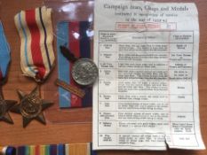 WW1 / WW2 FAMILY MEDALS COMPRISING WW1 PAIR AND DOG TAGS TO 1169382 A.M. A.E.