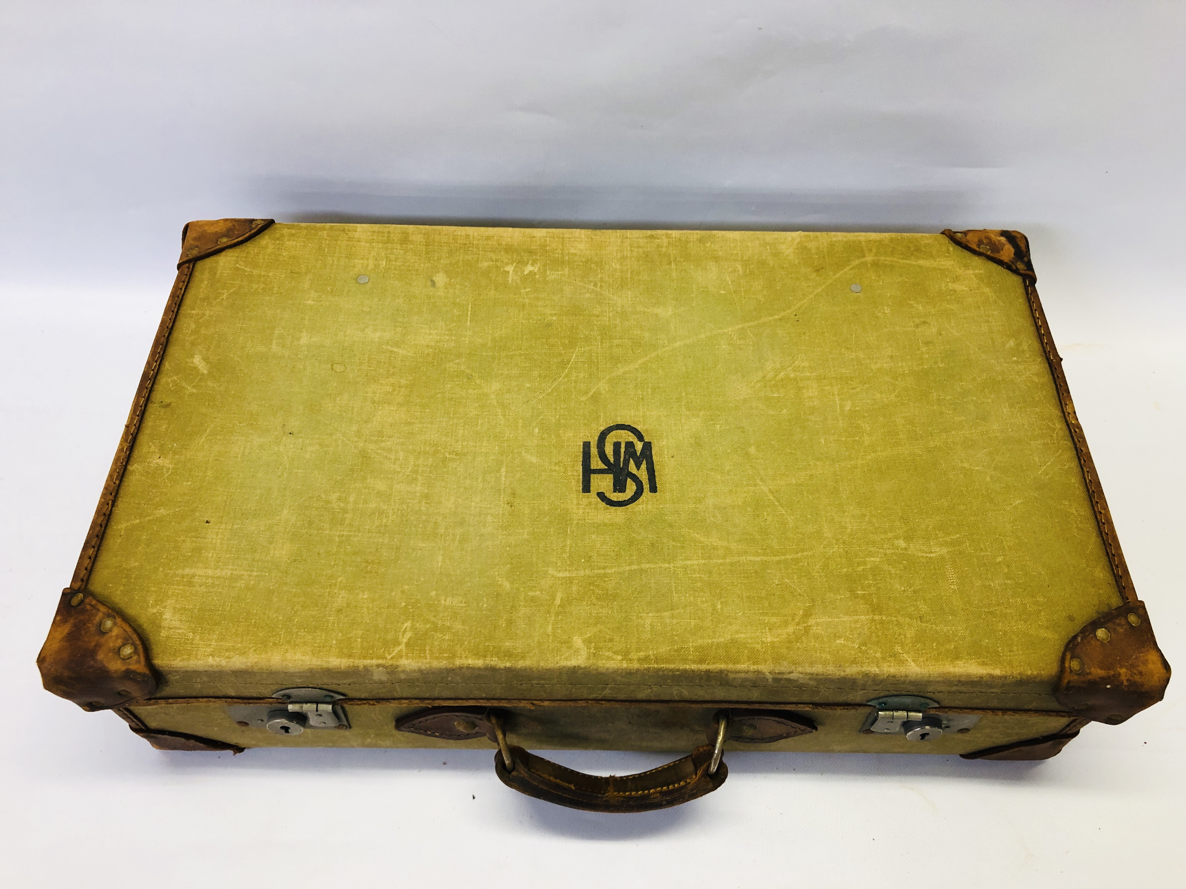 A VINTAGE CANVAS AND LEATHER BOUND SUITCASE STAMPED. - Image 2 of 6