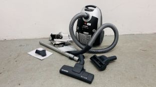 HOOVER ENIGMA VACUUM CLEANER WITH ACCESSORIES - SOLD AS SEEN.