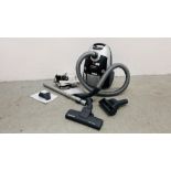 HOOVER ENIGMA VACUUM CLEANER WITH ACCESSORIES - SOLD AS SEEN.