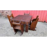 A CHILDS WOODEN HANDMADE PICNIC TABLE AND FOUR CHAIRS