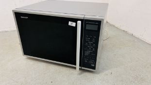 A SHARP JET CONVERSION AND GRILL MICROWAVE OVEN - SOLD AS SEEN.