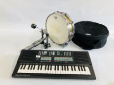 AN ANNON SNARE DRUM IN A PROTECTIVE CASE + MAPEX FOOT PEDAL AND YAMAHA PORTASOUND PSS-470 KEYBOARD