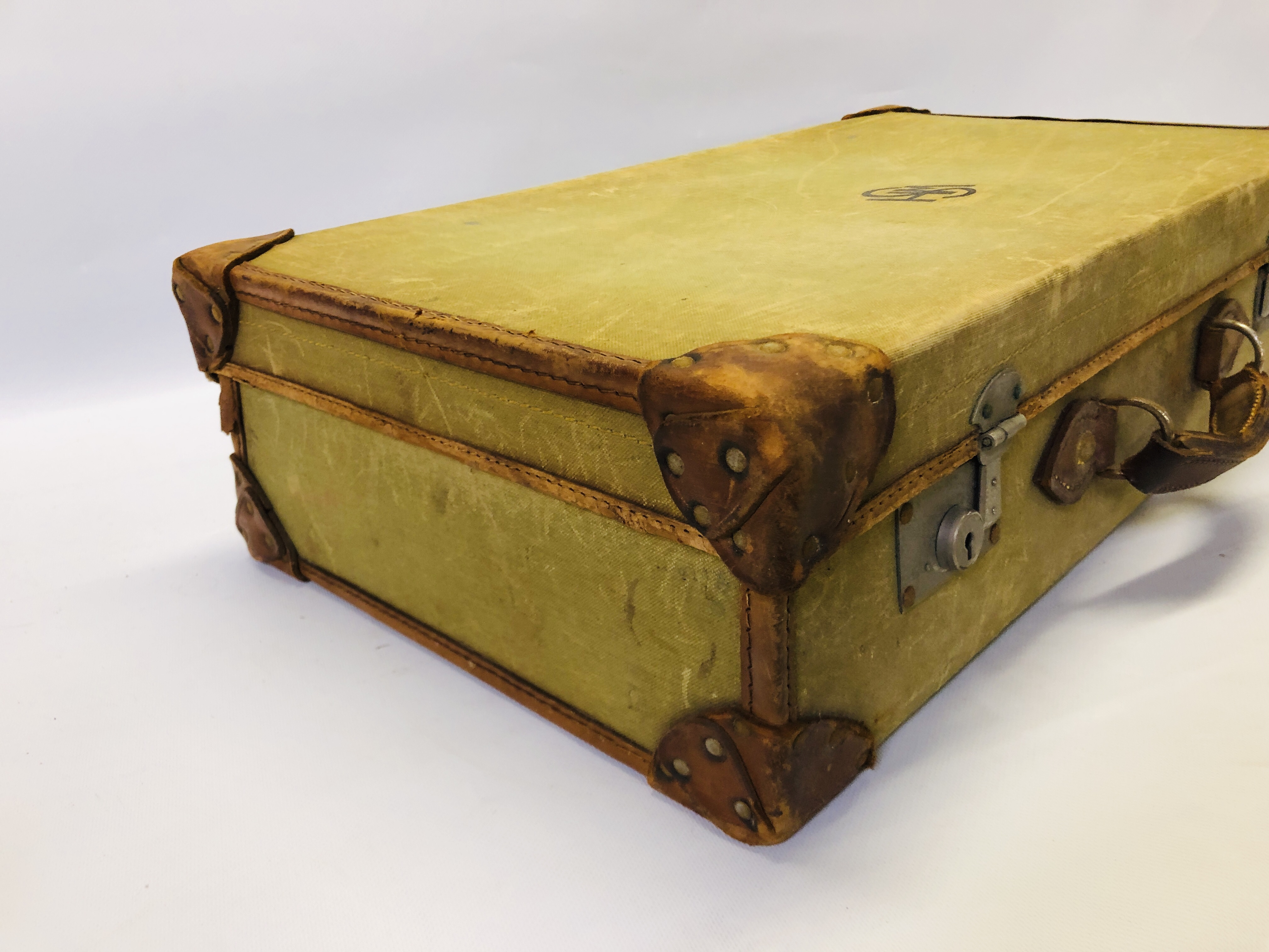 A VINTAGE CANVAS AND LEATHER BOUND SUITCASE STAMPED. - Image 3 of 6