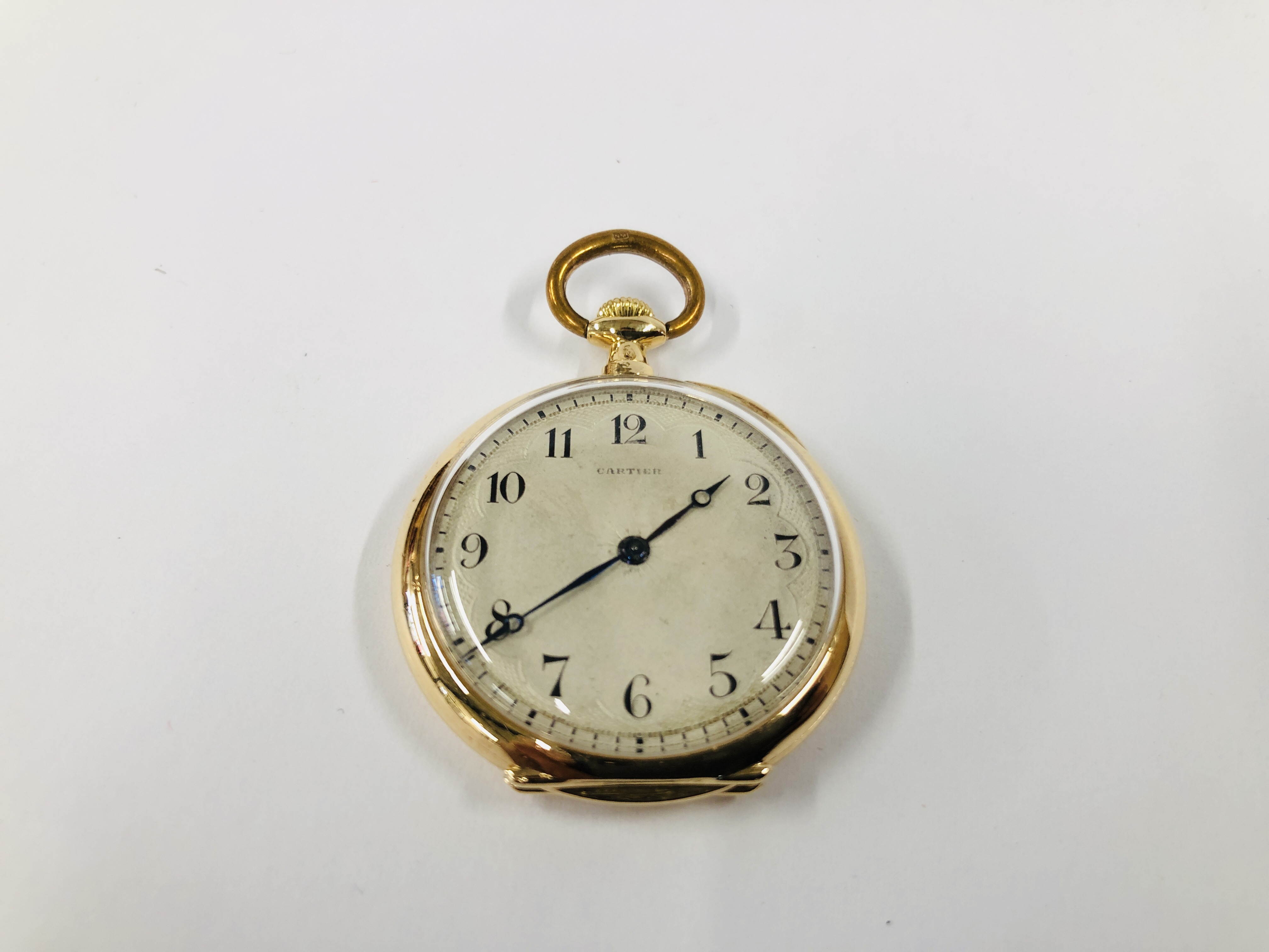 A VINTAGE 1930'S "CARTIER" 18K GOLD CASED POCKET WATCH, ENAMELLED DIAL.