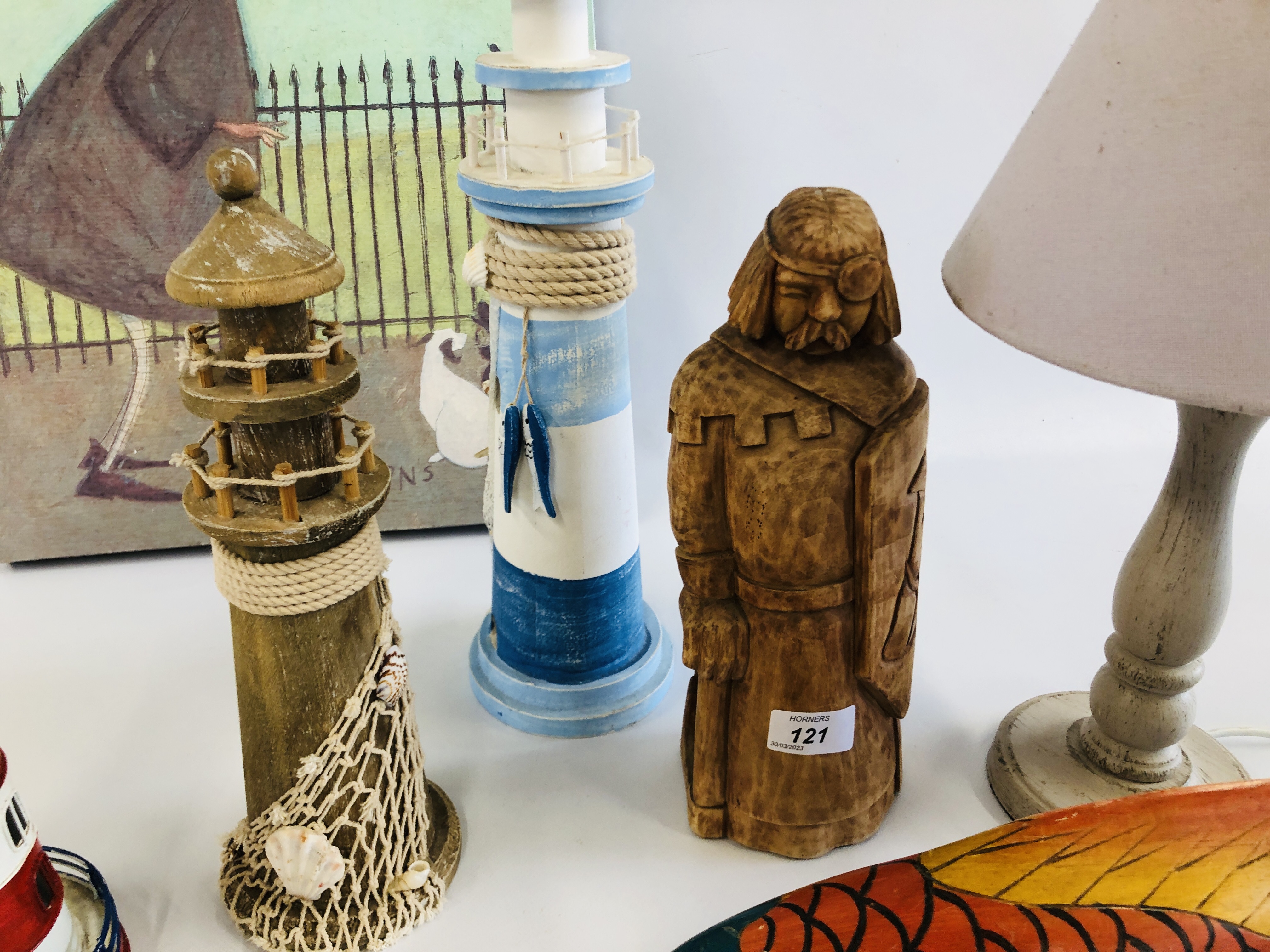 A GROUP OF DECORATIVE EFFECTS TO INCLUDE WOODEN LIGHTHOUSE, WOODEN FISH, WOODEN FISHERMAN FIGURES, - Image 6 of 8