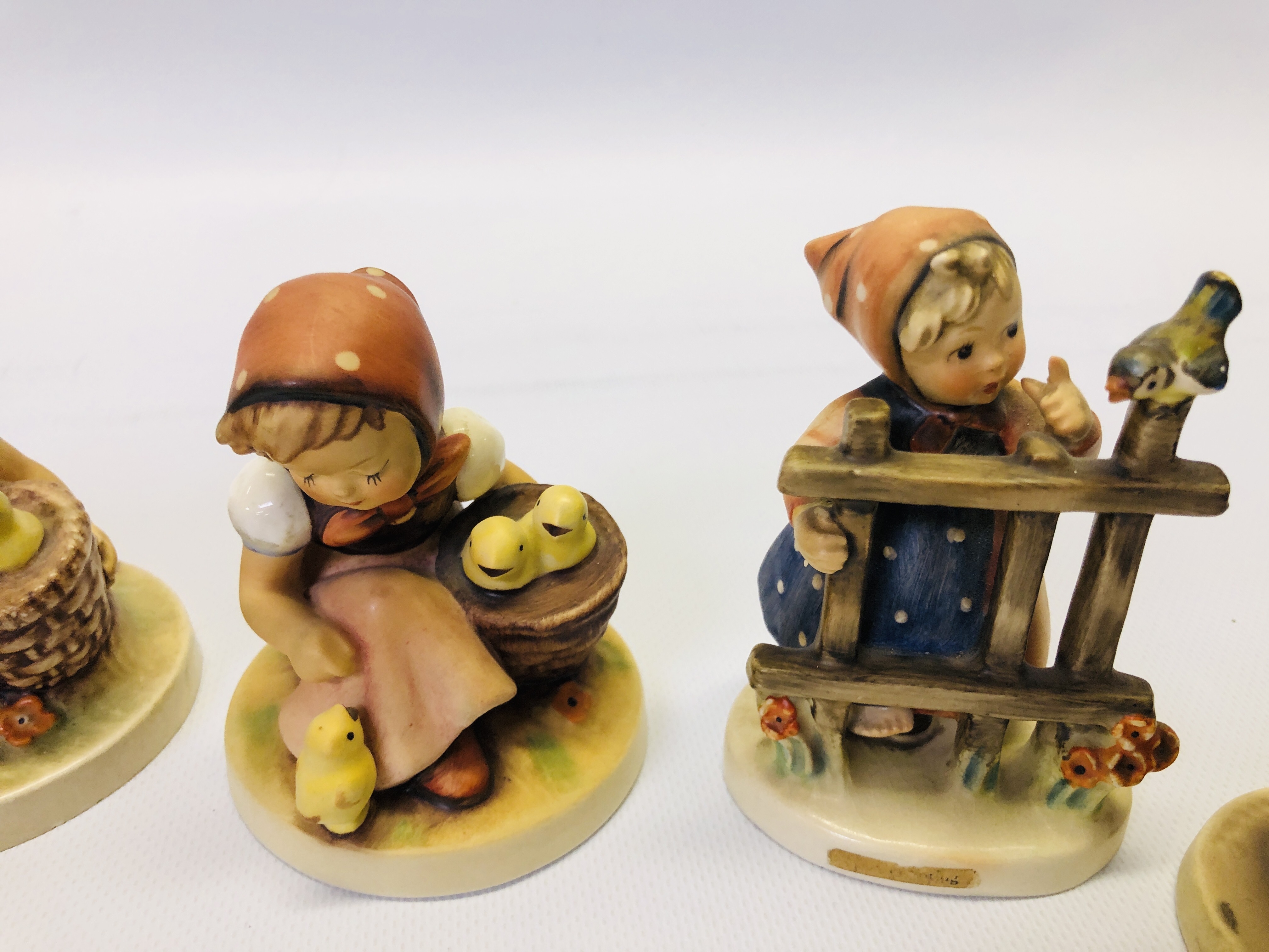 A GROUP OF 6 ASSORTED "GOEBEL" CABINET ORNAMENTS TO INCLUDE TWO EXAMPLES OF A SEATED CHILD WITH - Image 3 of 9
