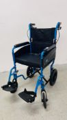 A CARECO FOLDING WHEELCHAIR.