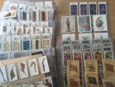 BOX WITH CIGARETTE CARDS IN PENNY ALBUMS, SOME COMPLETE,