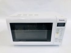 A PANASONIC WHITE FINISH MICROWAVE - SOLD AS SEEN.