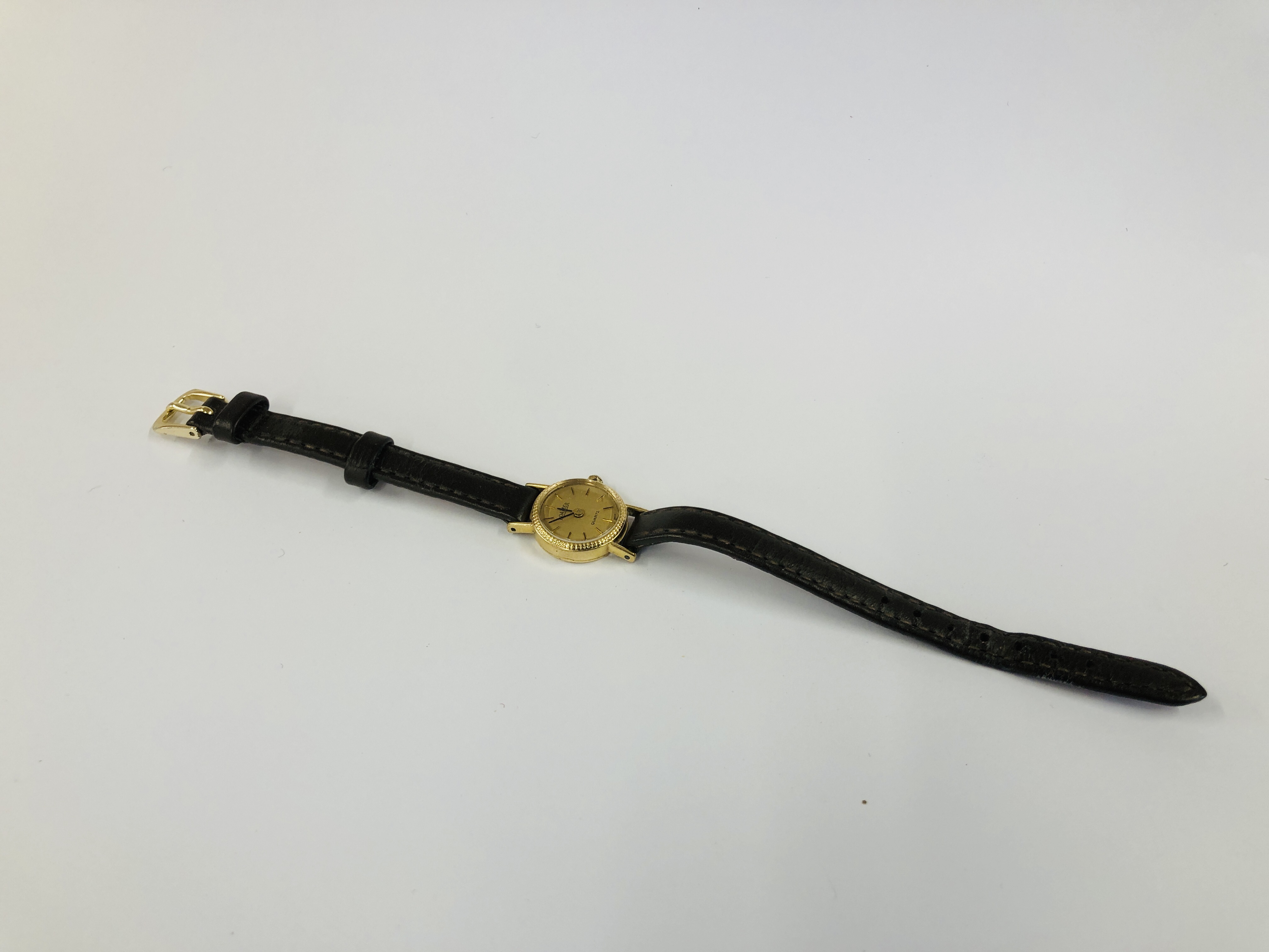 LADIES ROAMER 9CT GOLD CASED WRIST WATCH ON A BROWN LEATHER STRAP. - Image 5 of 12