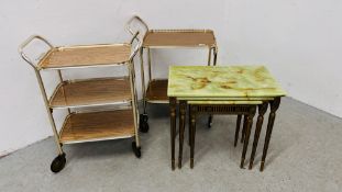 2 VINTAGE 60'S TWO TIER TEA TROLLEYS AND A NEST OF 3 RETRO GRADUATED TABLES WITH ONYX STYLE TOPS.