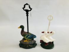 2 X CAST IRON DUCK DOOR STOPS.