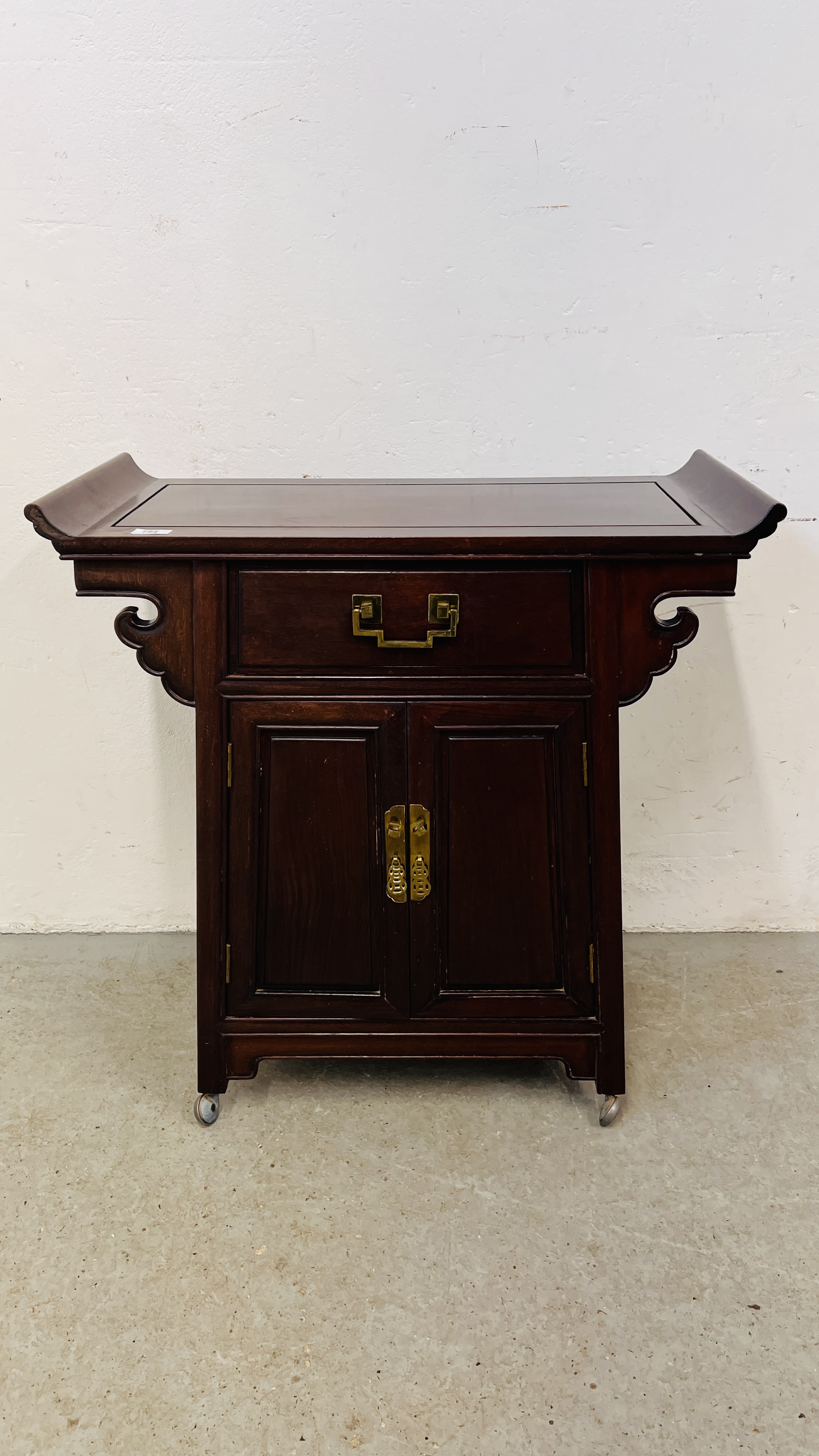 A CHINESE HARDWOOD ALTAR CABINET WITH SINGLE DRAWER AND BRASS HANDLES, W 76CM, D 36CM, H 80CM.