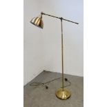 A MODERN BRASS FINISH ADJUSTABLE STANDARD LAMP - SOLD AS SEEN.