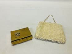 A VINTAGE BEADWORK EVENING BAG ALONG WITH A VINTAGE JEWELLED GILT COMPACT MARKED "VOLUPTE" U.S.A.