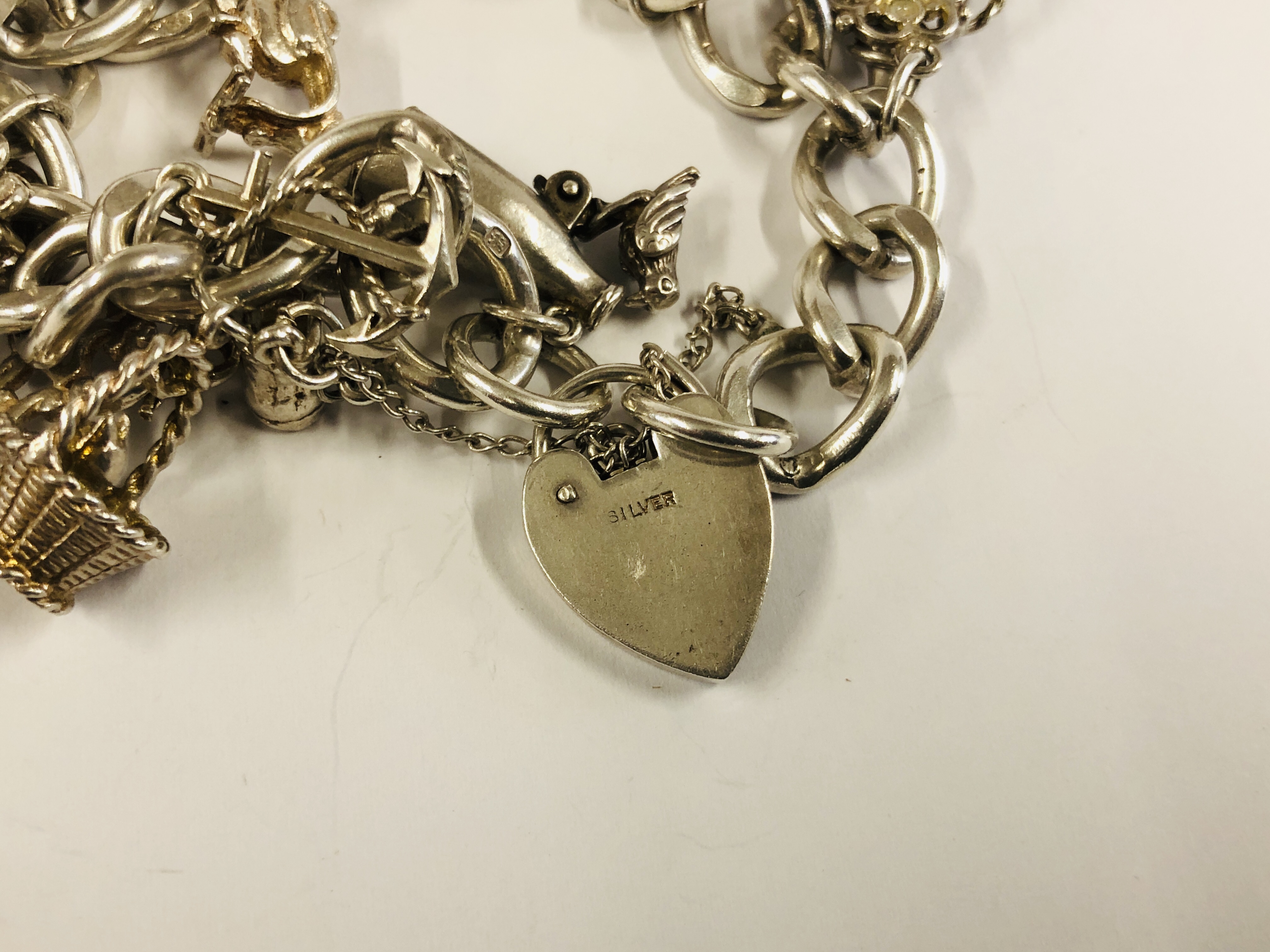 SILVER CHARM BRACELET WITH 13 CHARMS ATTACHED. - Image 2 of 6
