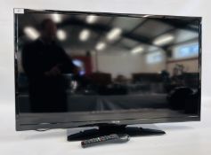 A CELCUS 40" FLAT SCREEN TV WITH REMOTE - SOLD AS SEEN.