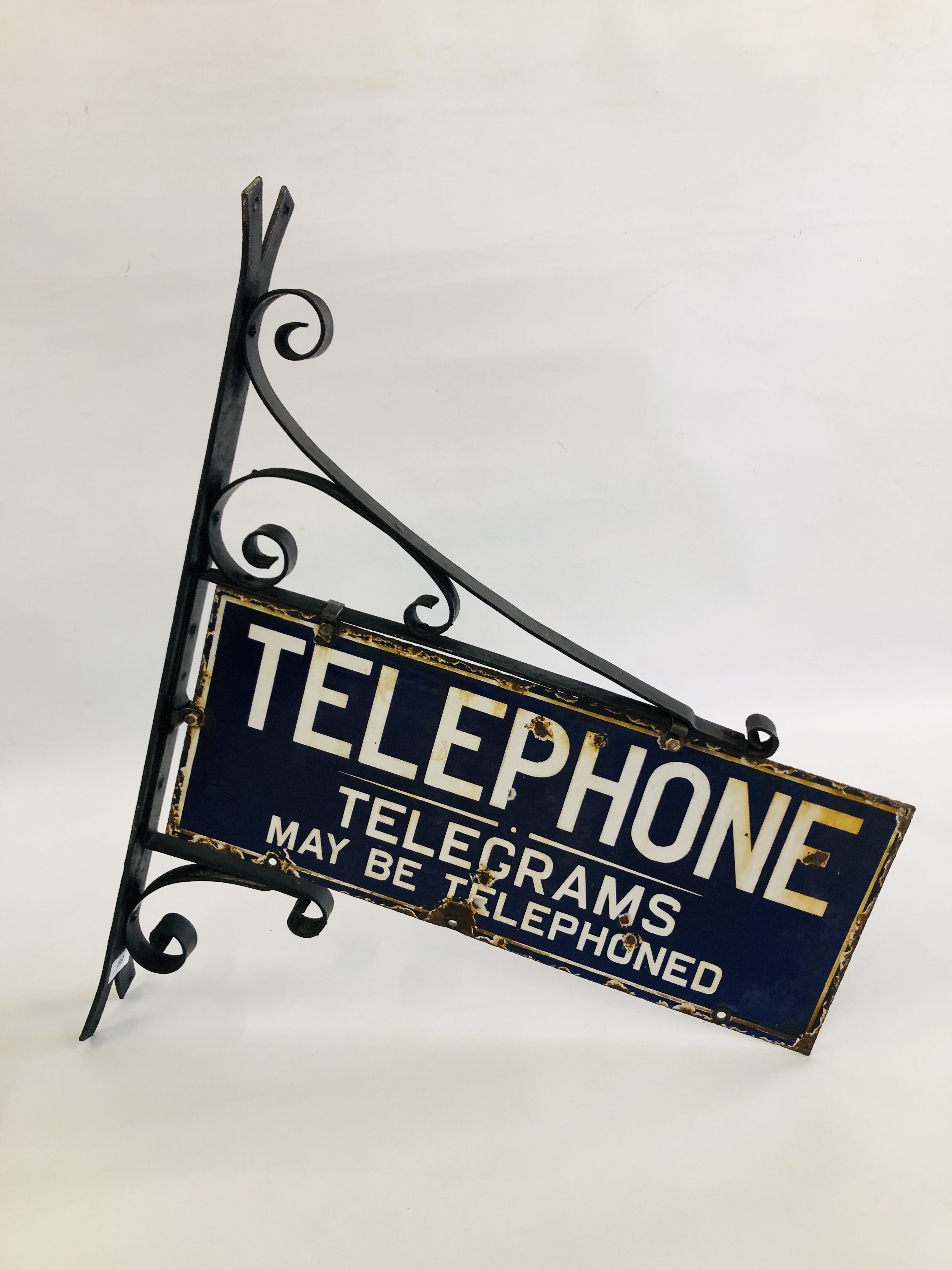 A VINTAGE ENAMELED TELEPHONE SIGN MOUNTED IN WALL BRACKET "TELEPHONE, - Image 2 of 12