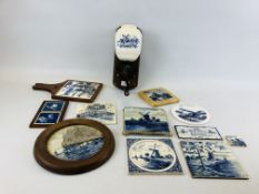 A GROUP OF DELFT TILES, STANDS AND PLAQUES ALONG WITH A WALL MOUNTED CHURN ETC.