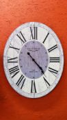 A REPRODUCTION LARGE OVAL WALL CLOCK W 64CM. H 8CM.