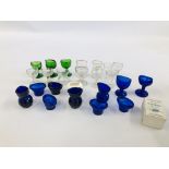 A COLLECTION OF MAINLY VINTAGE GLASS EYE BATHS TO INCLUDE CLEAR GLASS ALONG WITH BLUE AND GREEN