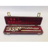 A VINTAGE FLUTE MARKED BLESSING ELKHART. IND U.S.A. 8836 IN A FITTED VELVET LINED HARD CASE.