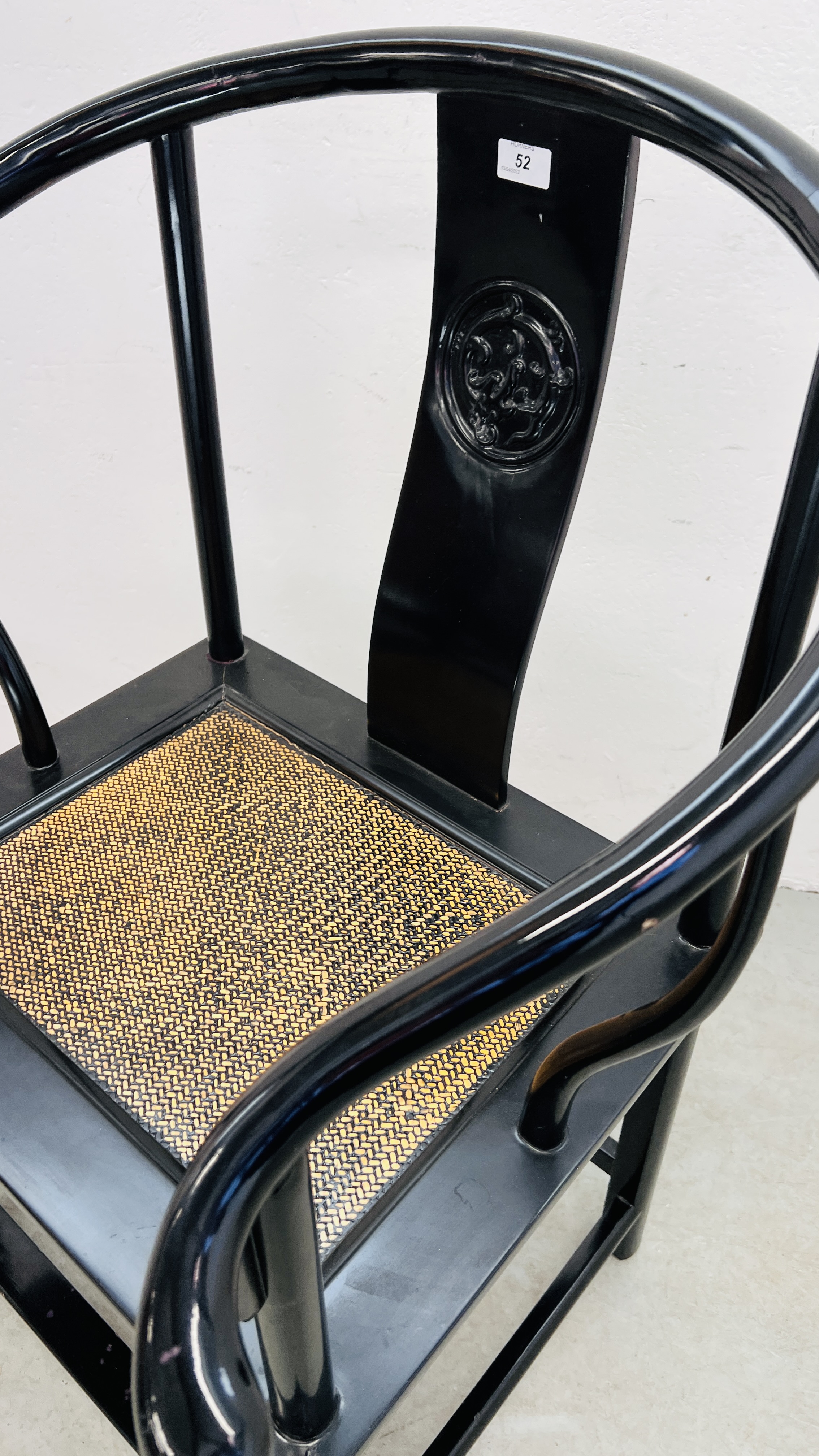 AN ORIENTAL BLACK LACQUERED ARM CHAIR WITH CARVED SYMBOL TO REAR SUPPORT. - Image 11 of 11