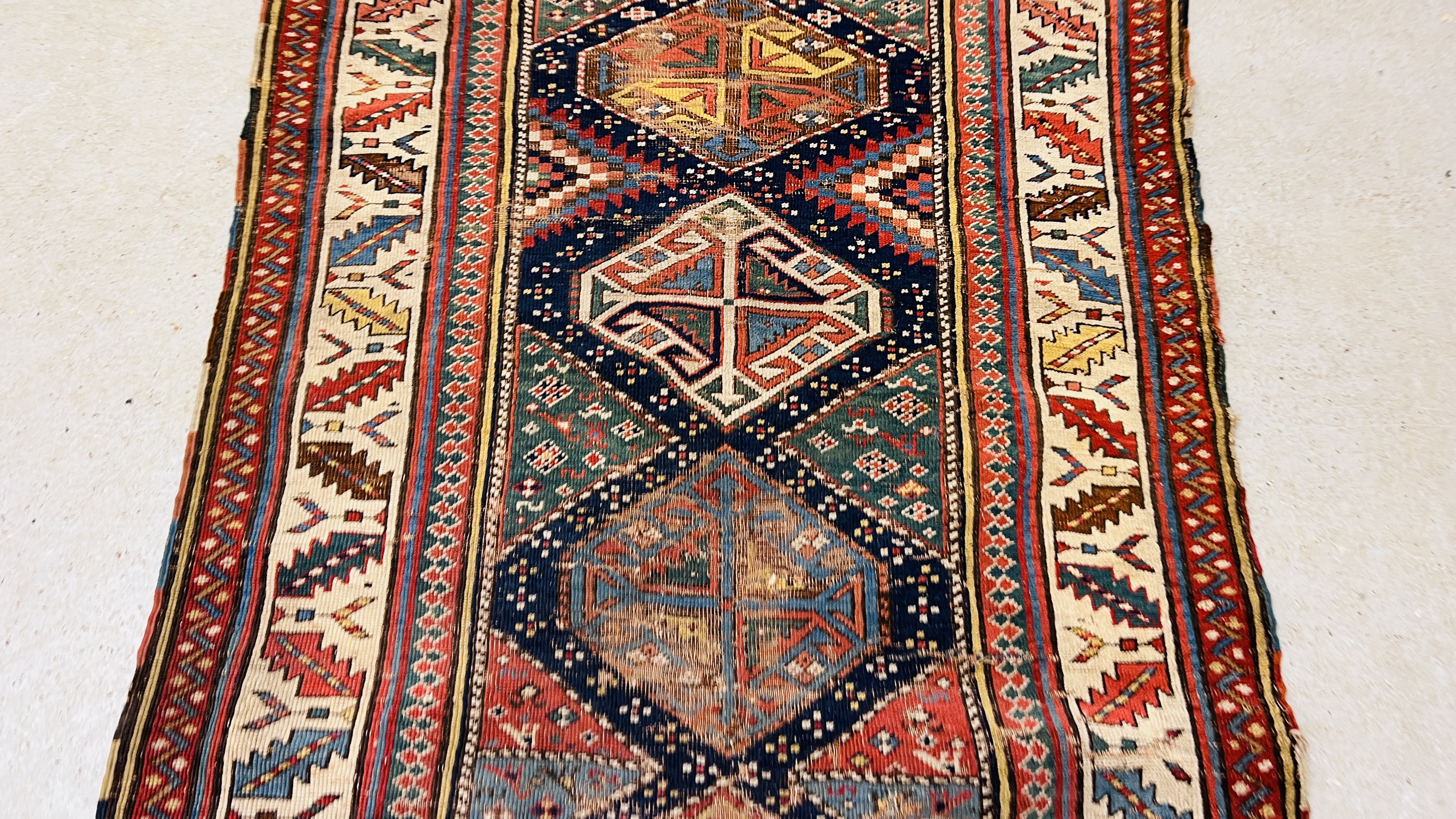 A TRADITIONAL CAUCASIAN RUNNER, POSSIBLY KAZAK, THE CENTRAL LOZENGES DIVIDED BY TRIANGULAR DESIGNS, - Image 5 of 8