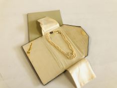 A VINTAGE DOUBLE ROW PEARL NECKLACE BY "MIKIMOTO" ALONG WITH AN ORIGINAL VINTAGE MIKIMOTO SILK