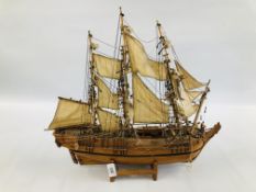 A WOODEN MODEL OF "BOUNTY" 1787 SAILING SHIP H 47CM X L 50CM.