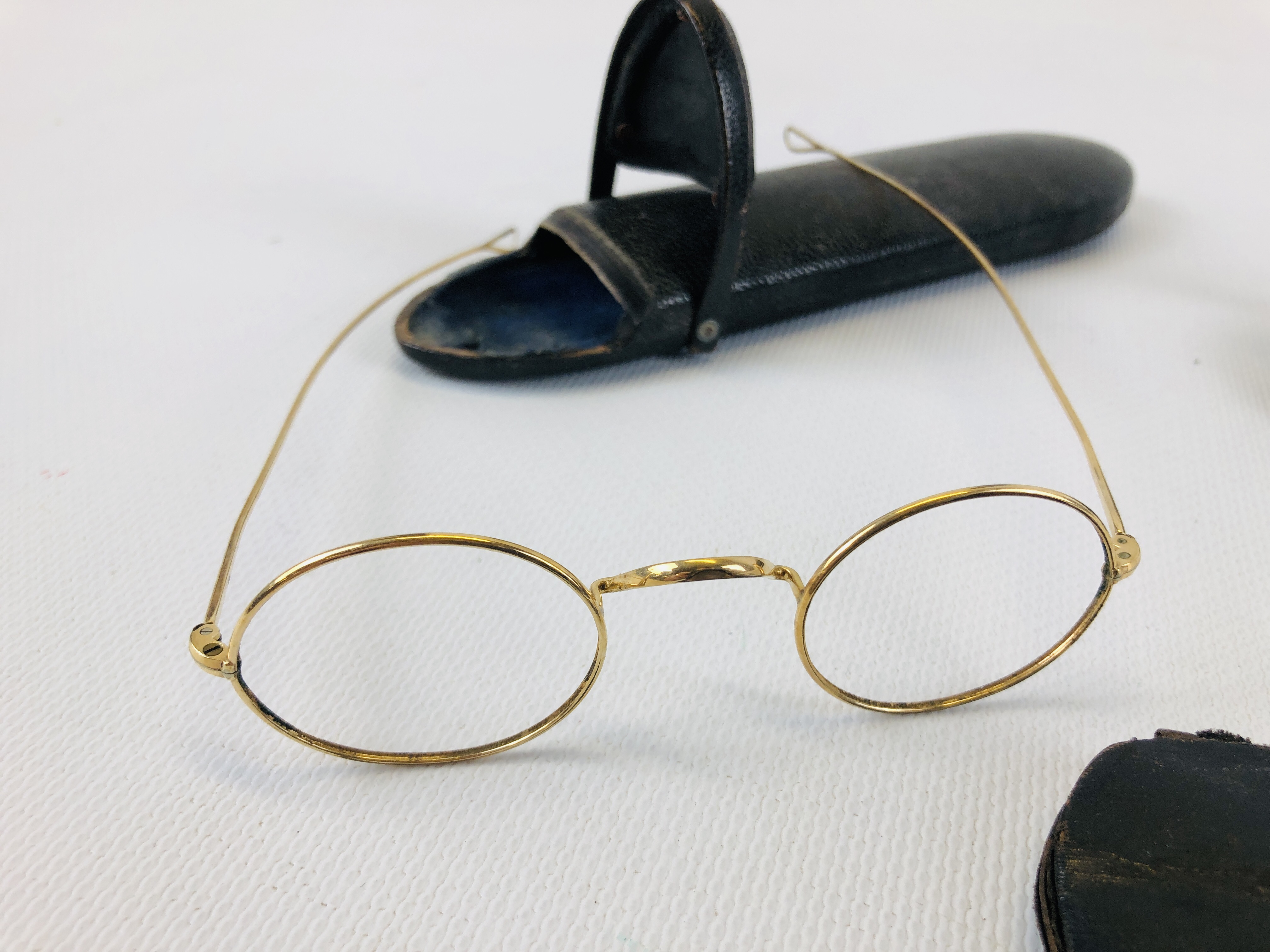 A GROUP OF VINTAGE GLASSES FRAMES TO INCLUDE TWO PAIRS OF YELLOW METAL EXAMPLES. - Image 3 of 11