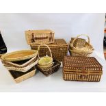A COLLECTION OF 12 WICKER BASKETS AND HAMPERS ALONG WITH A FURTHER INCOMPLETE PICNIC HAMPER.