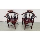 A PAIR OF ORIENTAL HARDWOOD AND MOTHER OF PEARL INLAID CORNER CHAIRS.